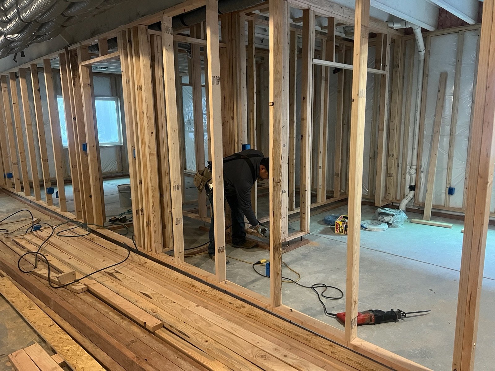 Basement remodel at the framing stage before drywall