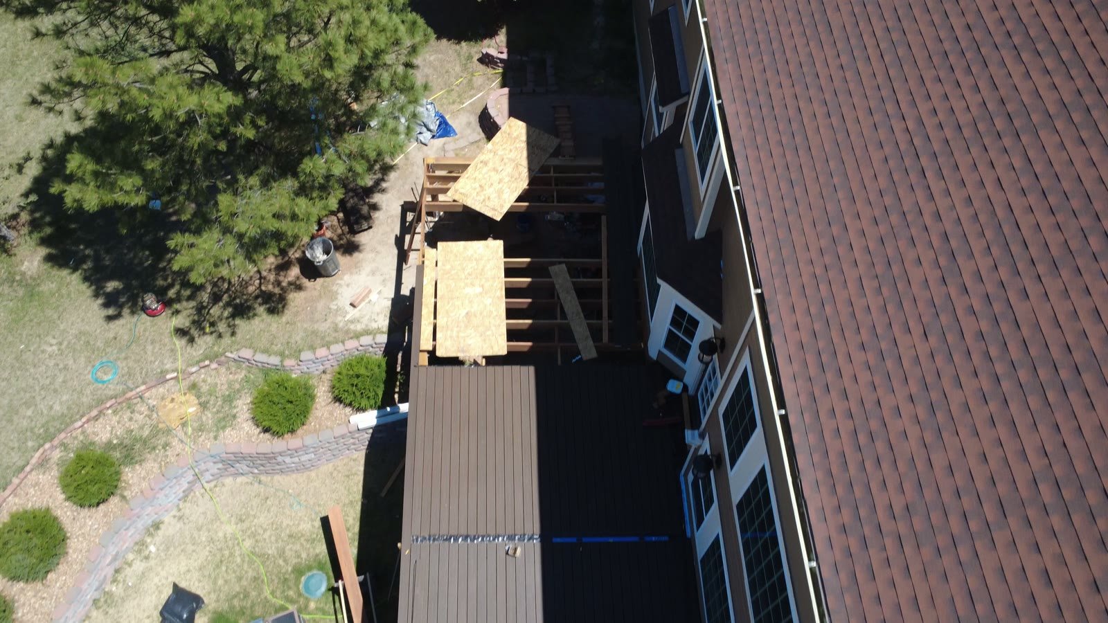 Hail, Sun, and Freeze: The Front Range Home Exterior Exposure Guide 1 Aerial view of asphalt shingle roof on a Front Range home