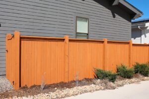 Semi-transparent stain showing the cedar grain on a horizontal fence