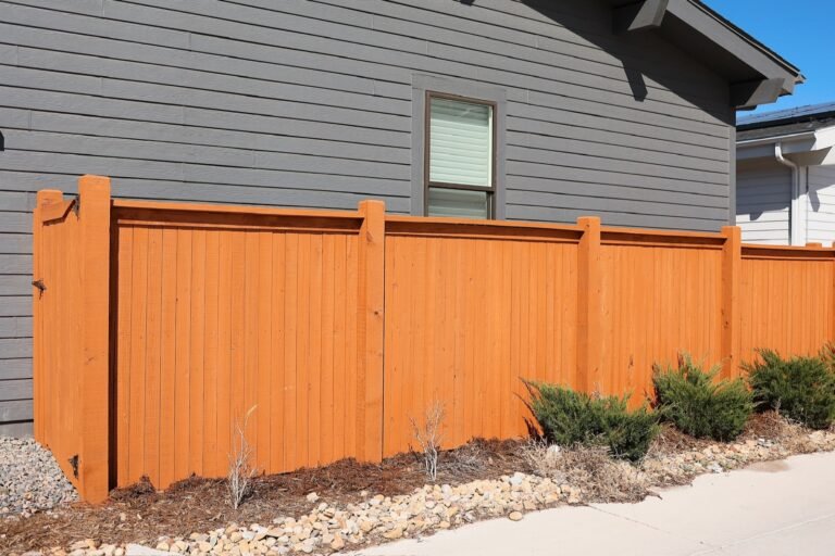 Semi-transparent stain showing the cedar grain on a horizontal fence